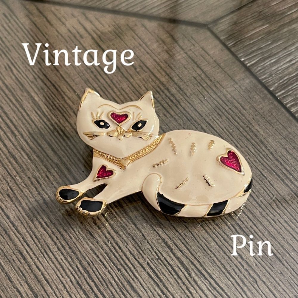 Vintage Enamel Cat Brooch with Gold-tone Accents and Red Heart Details